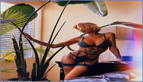 Tattooed Aussie model Tina Louise reveals she's joined OnlyFans and is offering FREE subscriptions